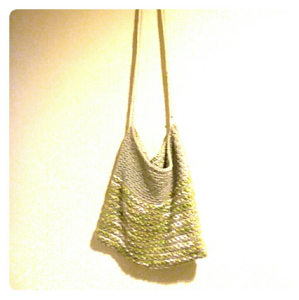 Hand knit green crossbody bag with crochet handle